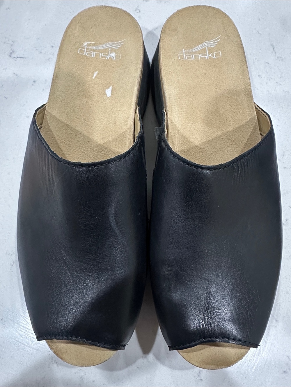Dansko Black Leather women’s Slip-On Mules